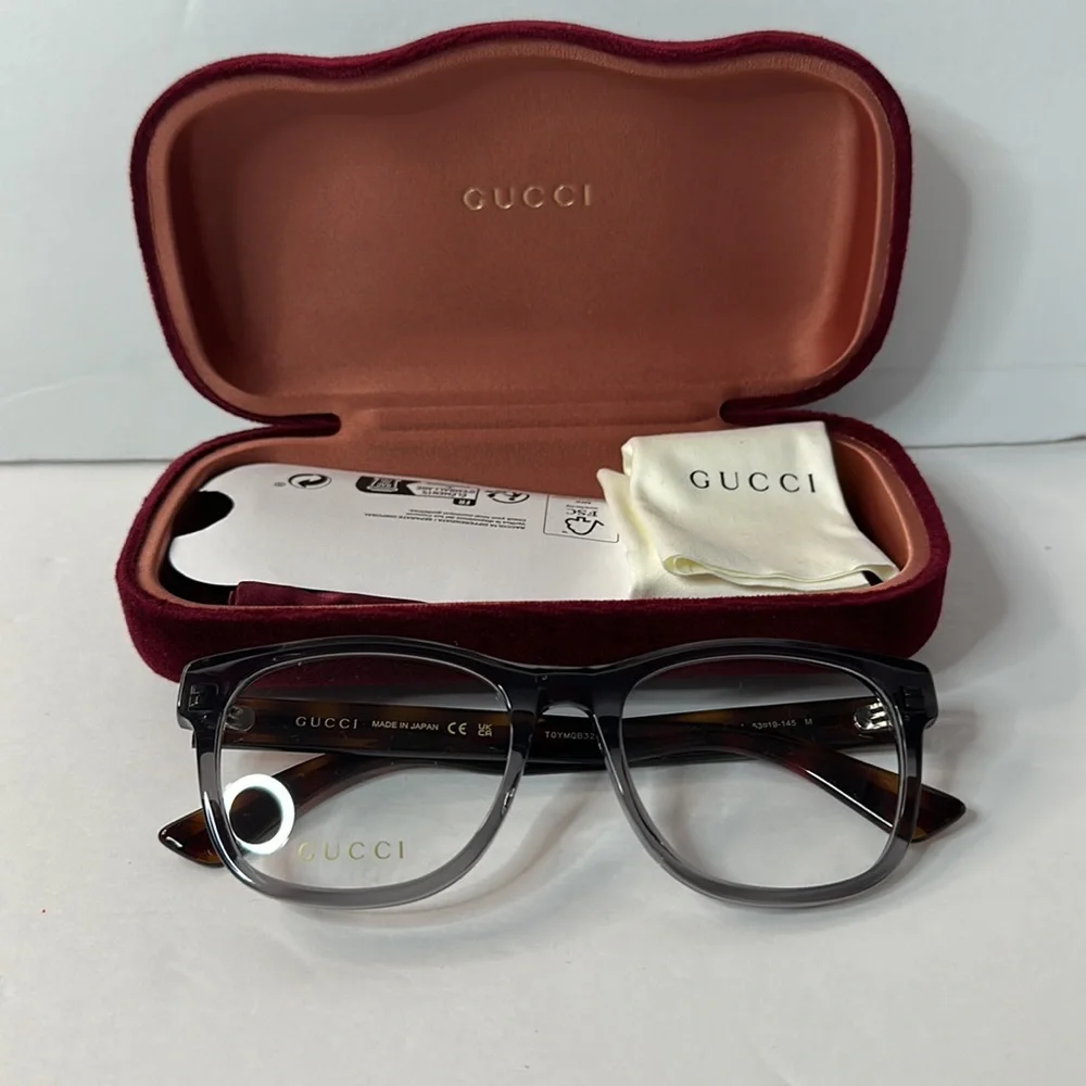 New- Auth - Gucci's GG0004ON soft lines across frames front.Iconic web effect…